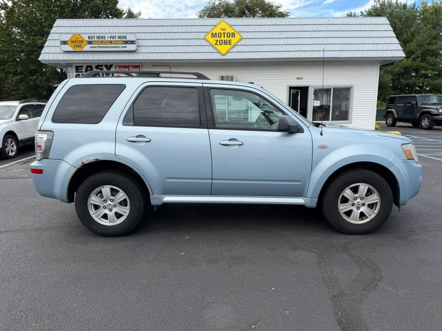 2009 Mercury Mariner I4 4WD (4M2CU91729K) with an 2.5L L4 DOHC 16V engine, 6A OD transmission, located at 1010 N White Horse Pike, Stratford, NJ, 08084, (856) 262-9500, 39.838921, -75.011497- Photo#0