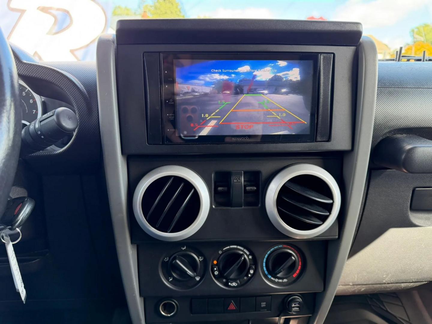 2009 Jeep Wrangler Sahara (1J4FA54109L) with an 3.8L V6 OHV 12V engine, located at 1010 N White Horse Pike, Stratford, NJ, 08084, (856) 262-9500, 39.838921, -75.011497- Photo#11